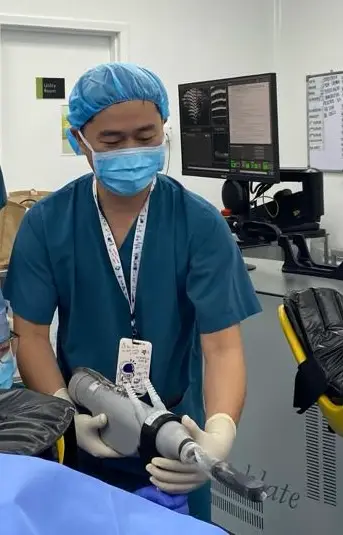 Urologist with HIFU equipment for prostate cancer treatment