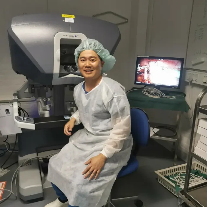 Dr Roger Anthony Idi performing robotic surgery using the da Vinci surgical system